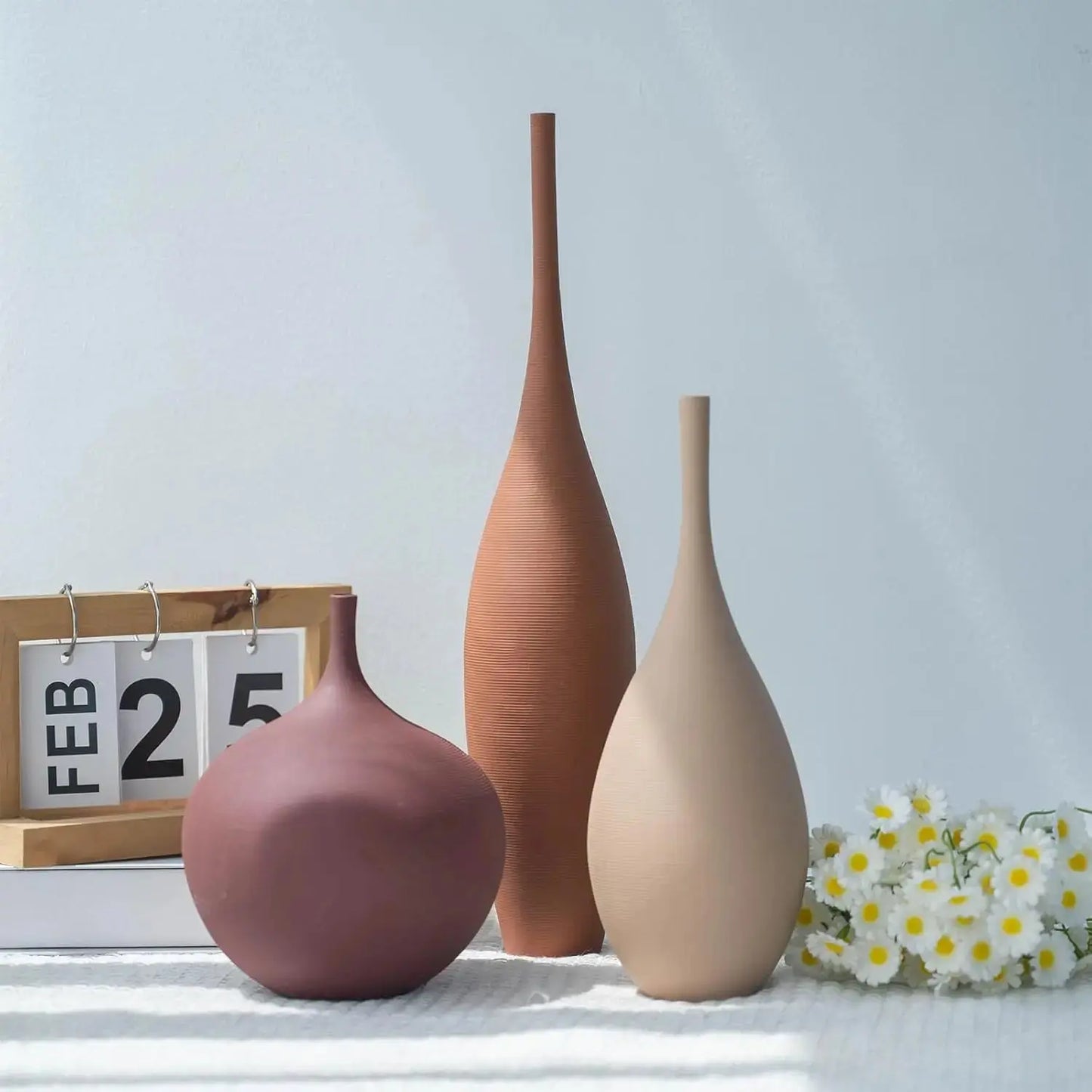Trio of Earth-Tone Ribbed Ceramic Vases comfydesigners
